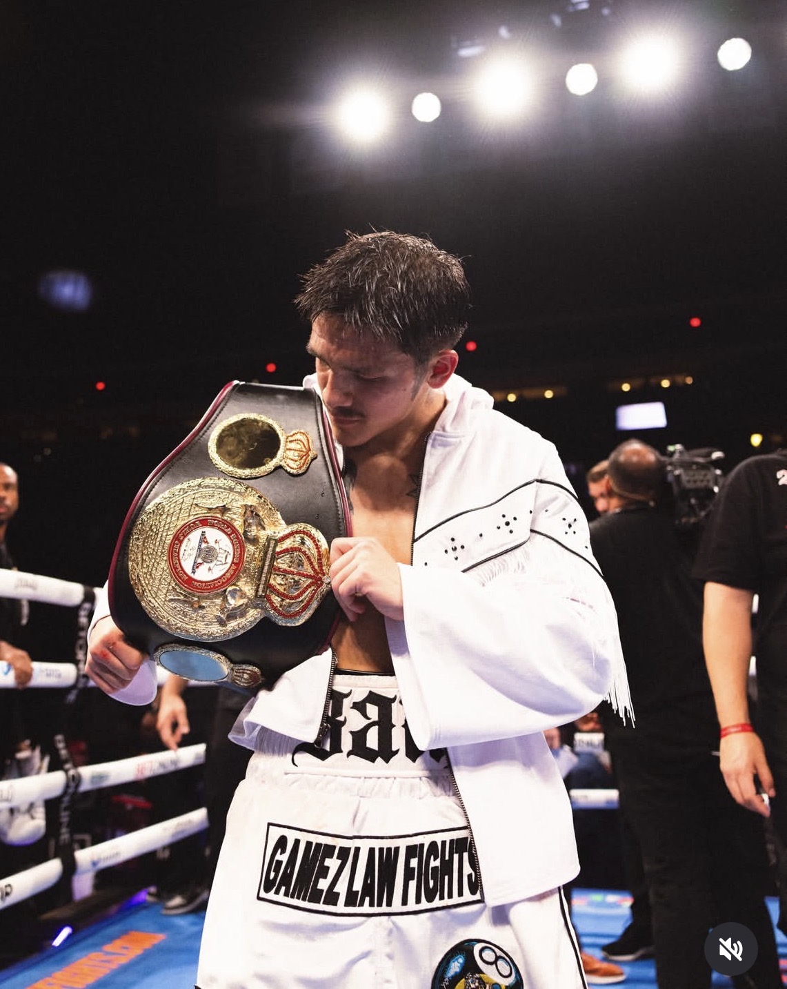 RGBA champion in the ring holding a title belt